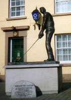Statue of President Clinton Golfing in Ireland