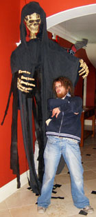 halloween decorations - huge skeleton grabbing the Bean
