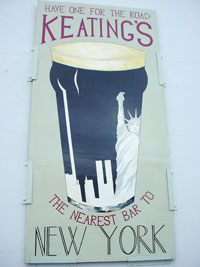 Sign for keatings that reads: Have one for the road - keatings, the nearest bar to New York City