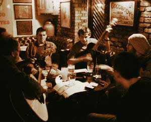 Players gather round the table at the shack pub in Athlone