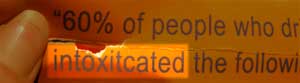 zoom on breathliser poster from alchoholtester.ie with misspelled word: intoxiticated