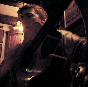 Hardy playing guitar at the Shack Session