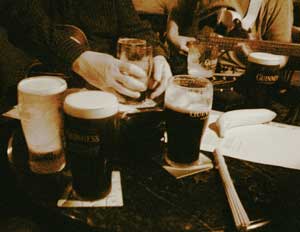 Table filled with instruments and pints at The Shack in Athlone
