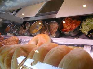 o'brien's sandwich bar fixings with bagels in the foreground