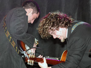 sean lightholder and the schoolmaster rock out as Kerbside in Athlone Castle at the Castle Rocks triathlone festival