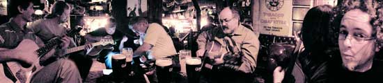 musicians gathered around the table at the shack session in athlone
