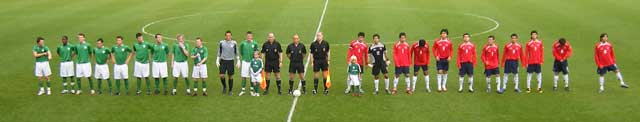 ireland versus chile in athlone town stadium - the players line up before the game