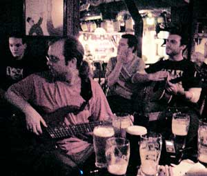 Players gather round the table at the shack pub in Athlone